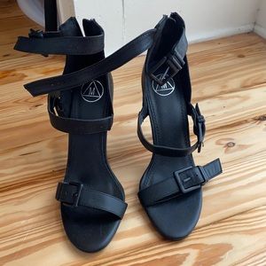 Black buckle heels NWOT